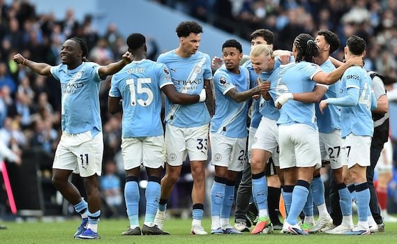 man-city-triumph-as-haaland-clinches-vital-win-over-arsenal;-liverpool’s-salah-shines-in-emotional-everton-derby-farewell